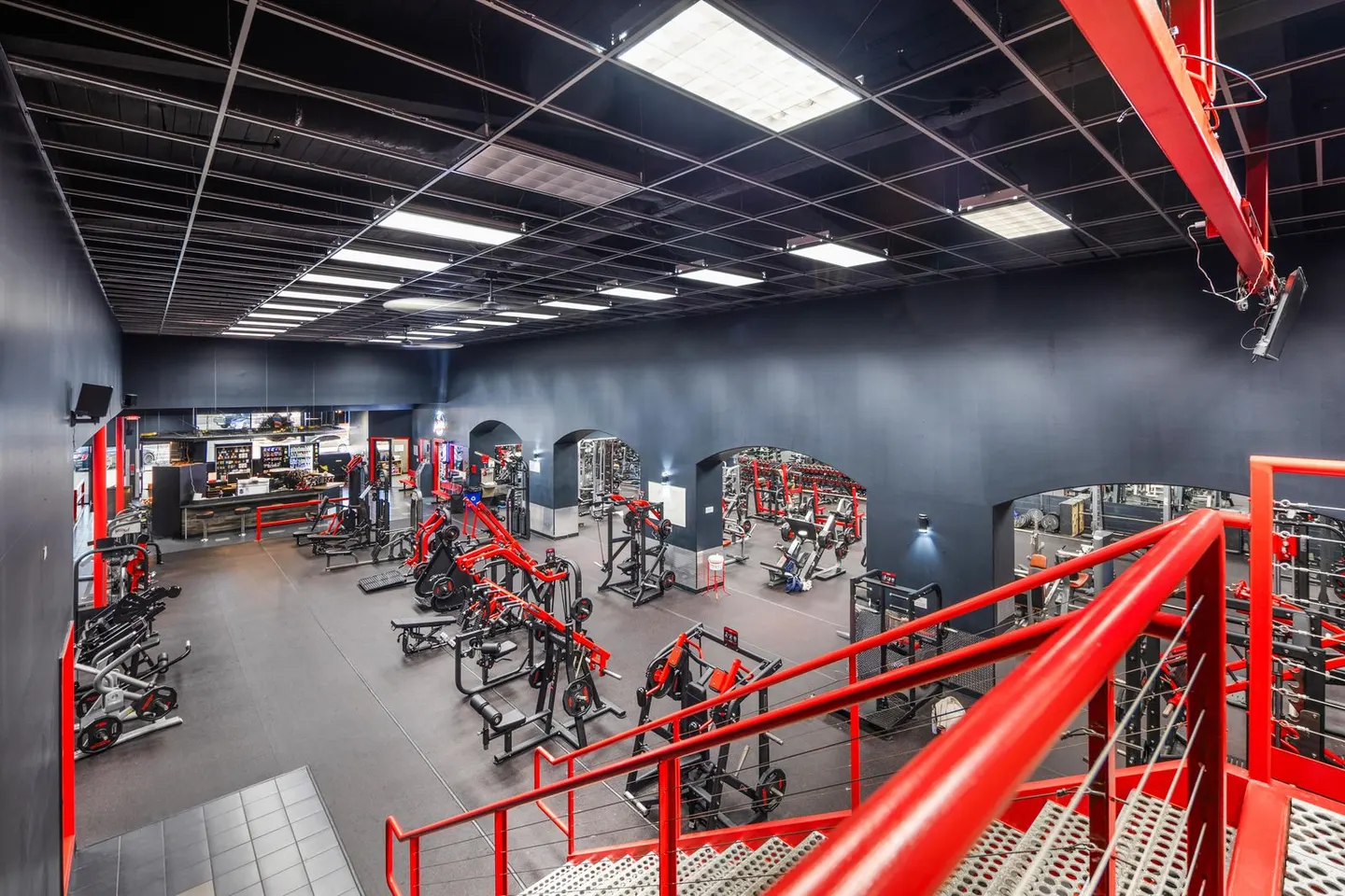 The strength floor at KlickWay Athletics Marysville, seen from the mezzanine stairs