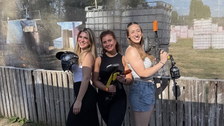 Team members at the company paintball outing