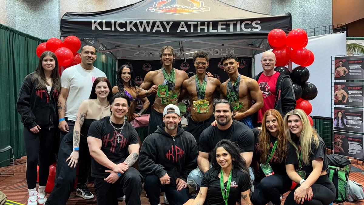 The KlickWay Athletics team celebrating medal wins at the NPC Emerald Cup booth