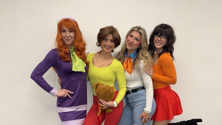 Front desk team dressed as the Scooby-Doo crew for Halloween