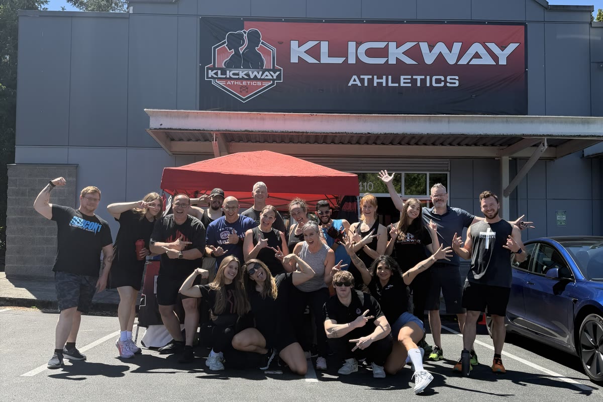 Renton members and staff celebrating outside the gym after the 8-Week Challenge